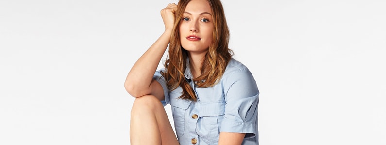 woman in blue button down shirt