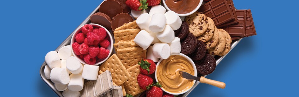 Platter with assorted sweets for a s’mores station