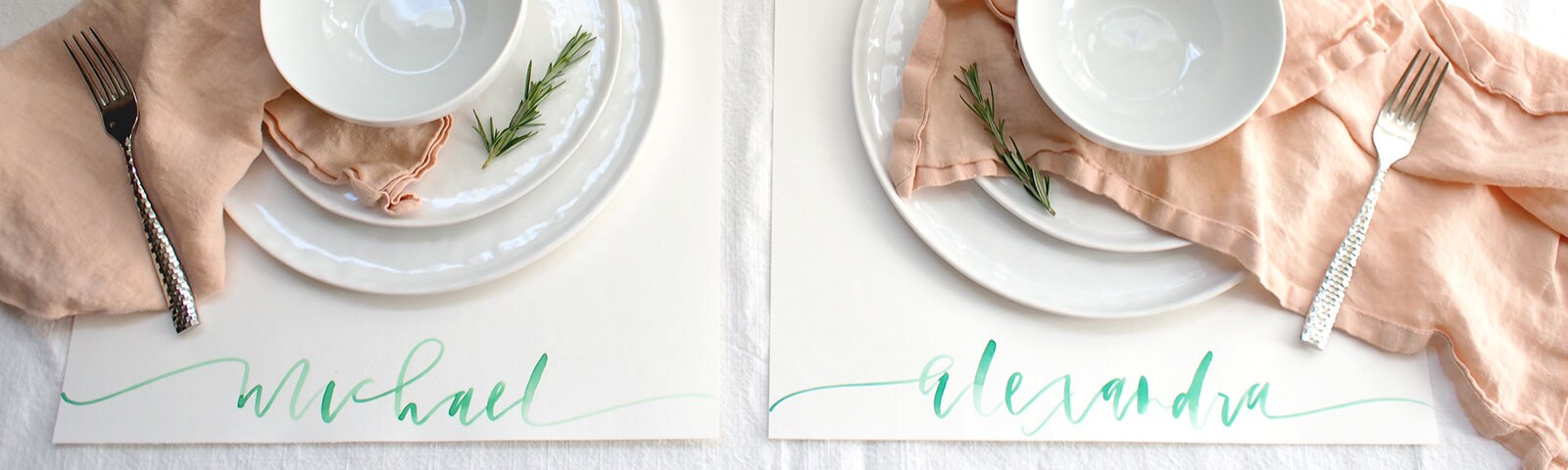 Calligraphic writing of names that act as placecards at dinner Calligraphic writing of names that act as placecards at dinner