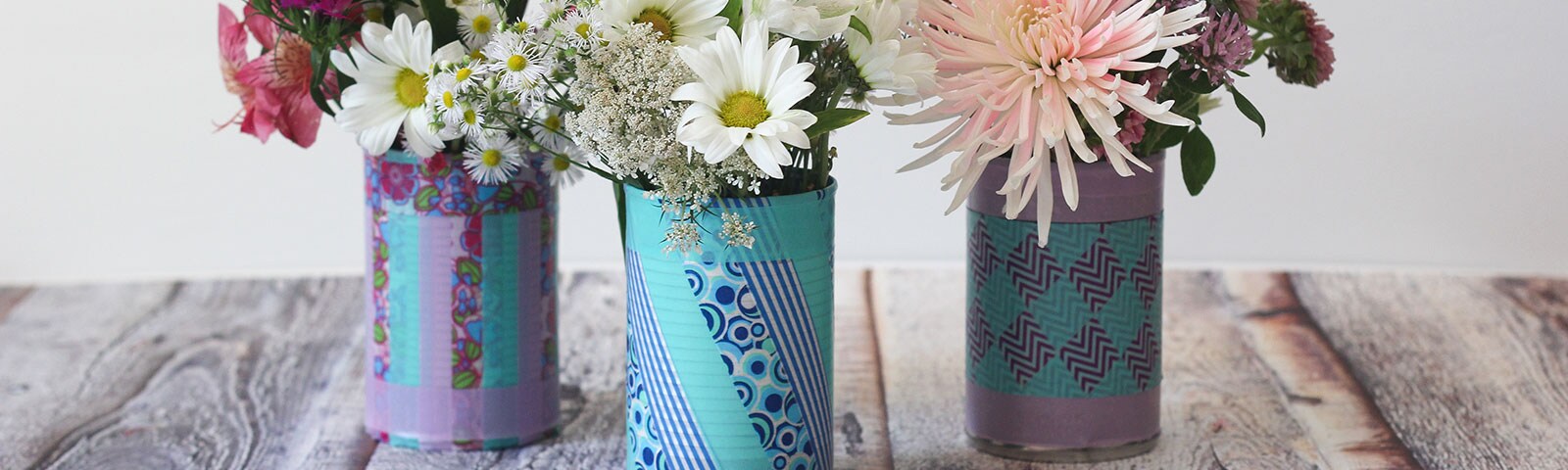 Flowers in tin cans