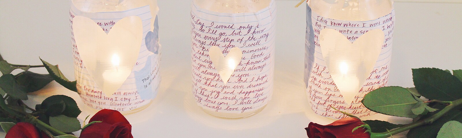 Heart cut out love notes on mason jars Heart cut out love notes on mason jars