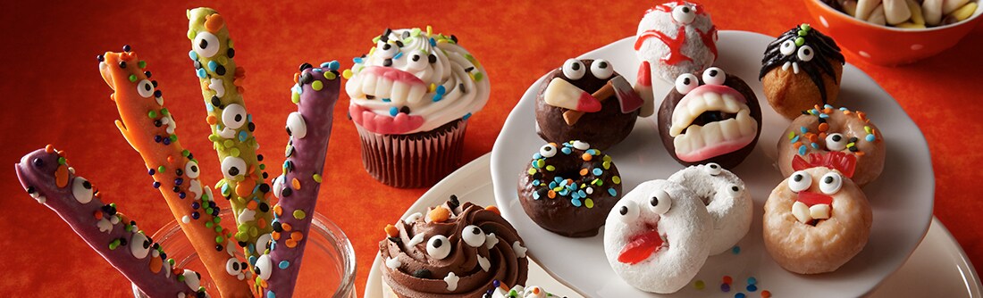 Monster themed donuts and chocolates with sprinkles